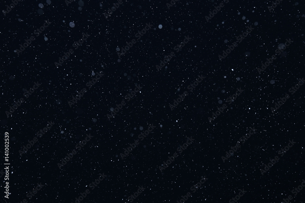 Fototapeta premium snow on a black background