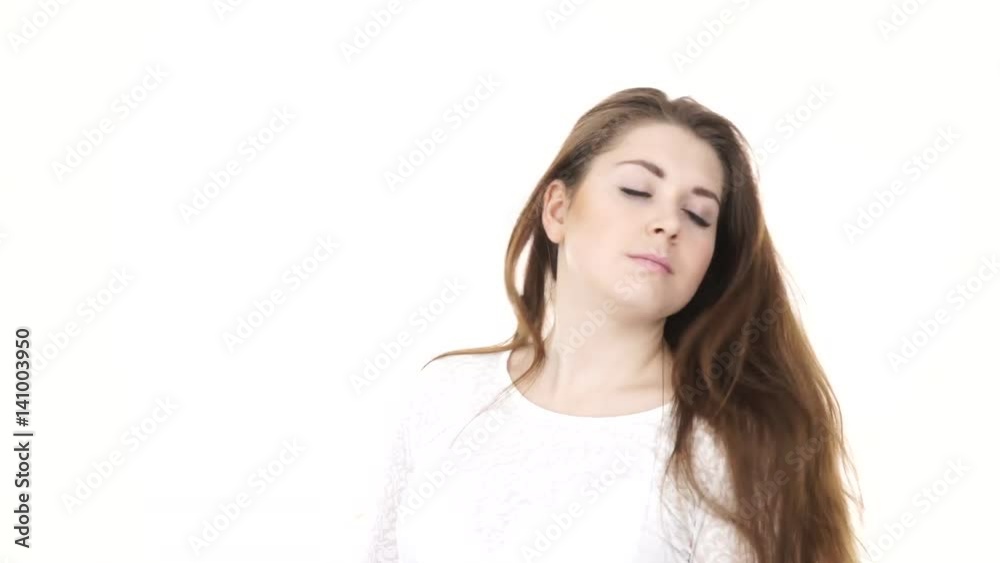 Woman with hair tied in ponytail loosing her long smooth natural brown hairs. Haircare concept. Studio shot, isolated on white 4K ProRes HQ codec Woman with hair tied in ponytail loosing her long smooth natural brown hairs. Haircare concept. Studio shot, isolated on white 4K ProRes HQ codec