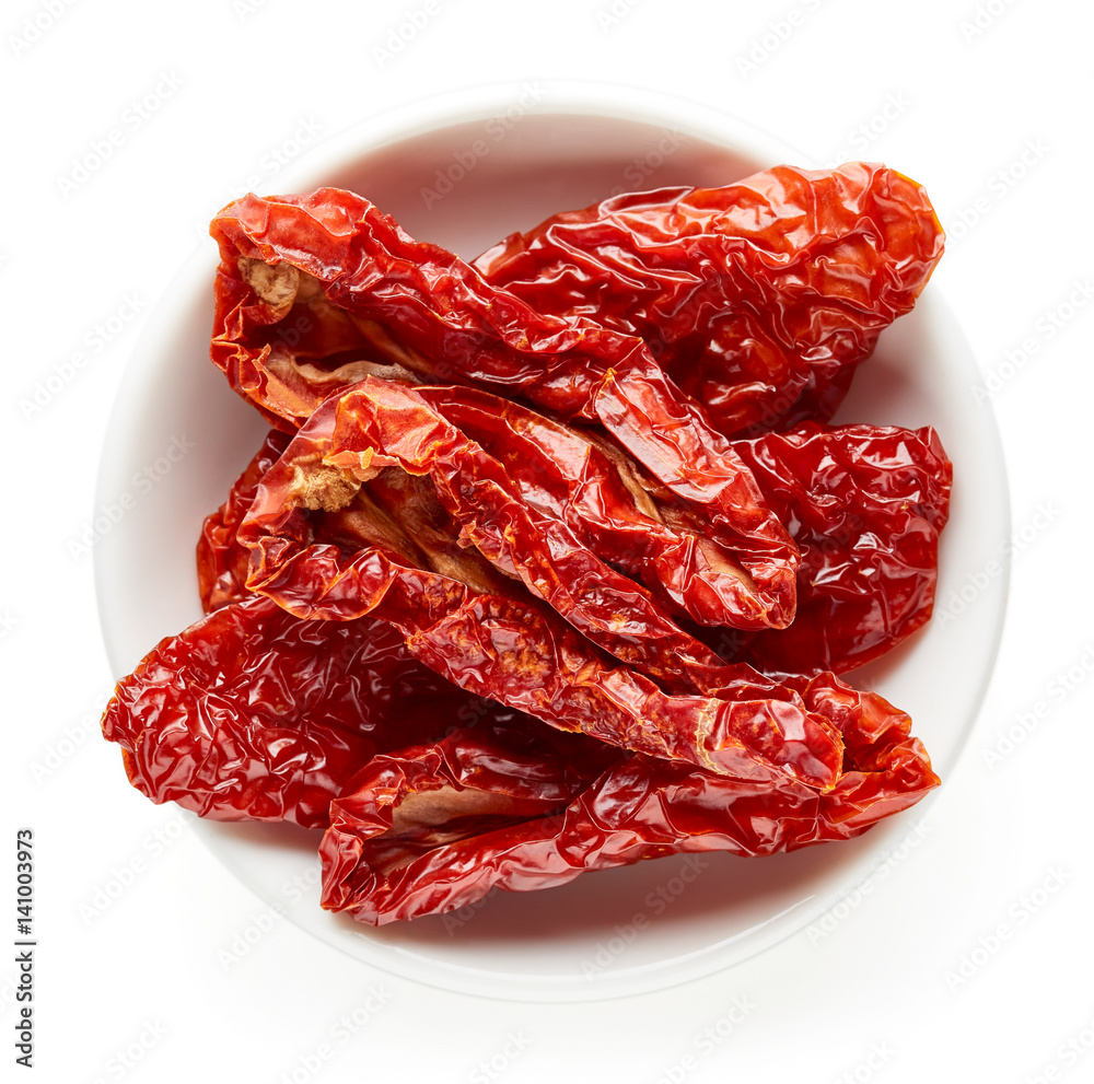 Bowl of sun dried tomatoes from above - obrazy, fototapety, plakaty 