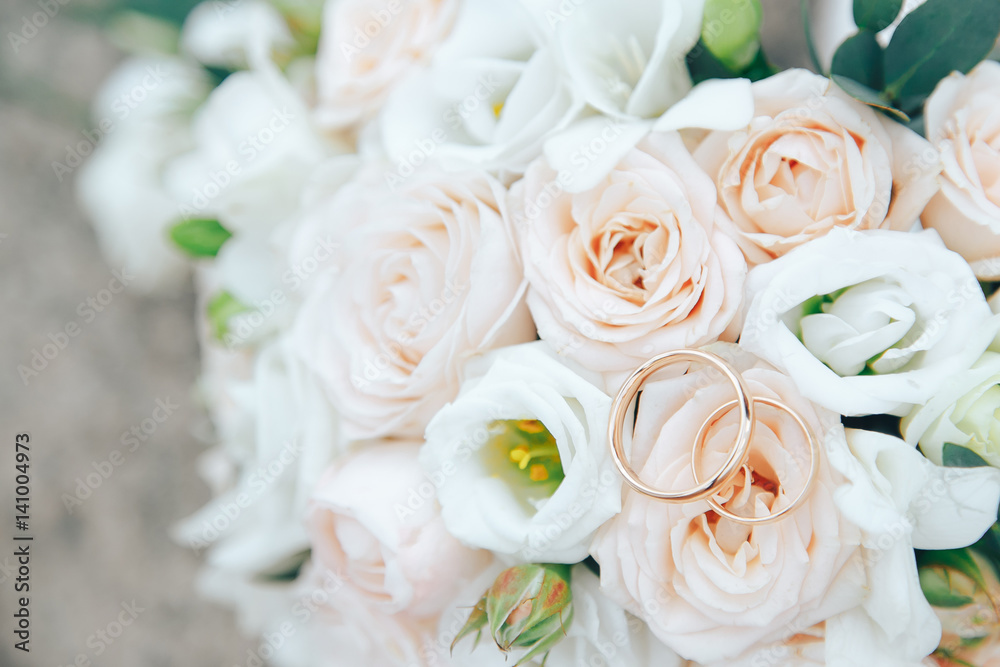 .Wedding bouquet in the hands of the bride