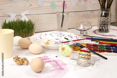 Painting Easter eggs with watercolor and markers. photo