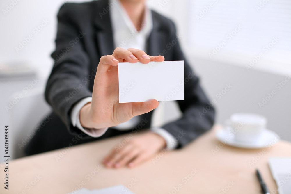 Business woman giving visit card Business woman giving visit card