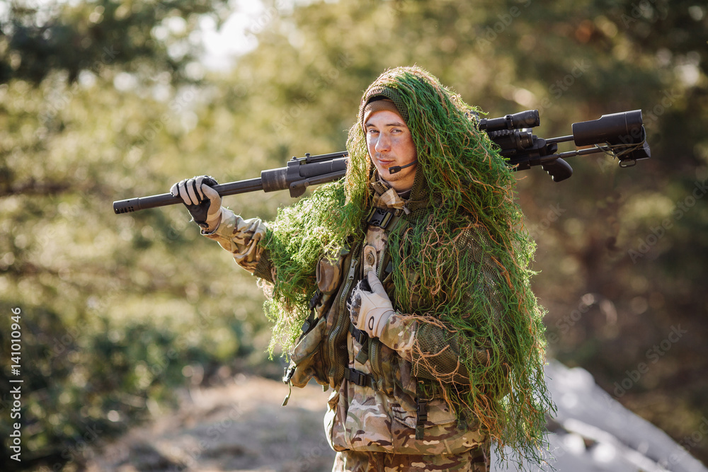 Fototapeta premium Army sniper during the military operation.