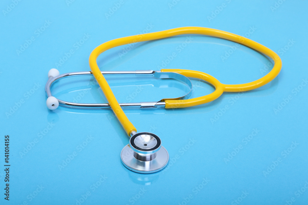 Stethoscope and medical equipmenton on blue background Stethoscope and medical equipmenton on blue background