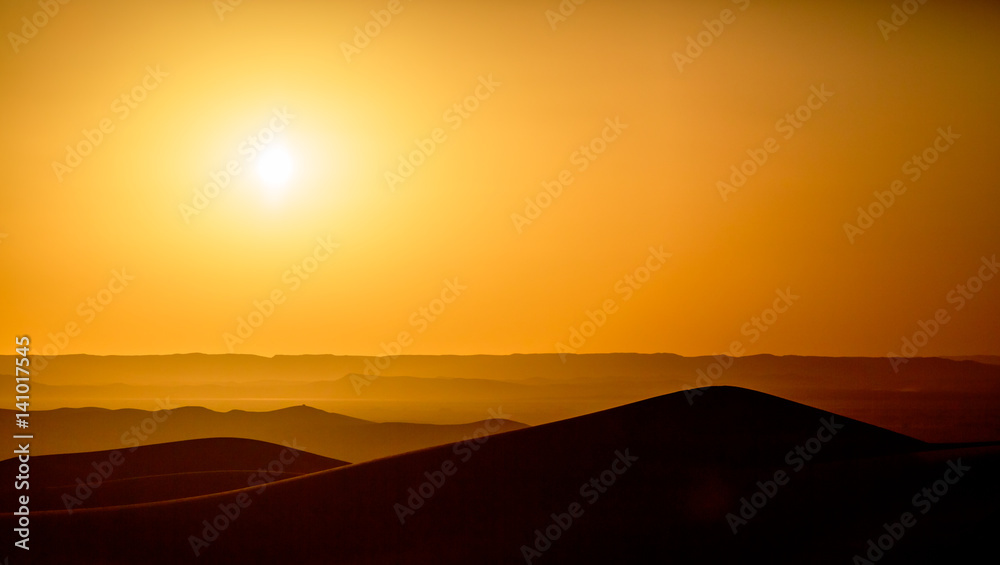 Beautiful sunset over the sand dunes in the Sahara desert, Morocco