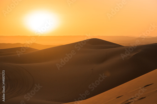 Beautiful sunset over the sand dunes in the Sahara desert, Morocco