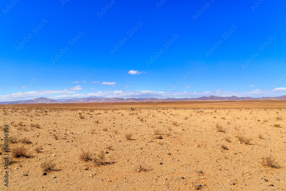 Beautiful Moroccan landscape, Sahara desert, stones against the sky