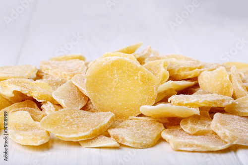 Candied ginger on white.
