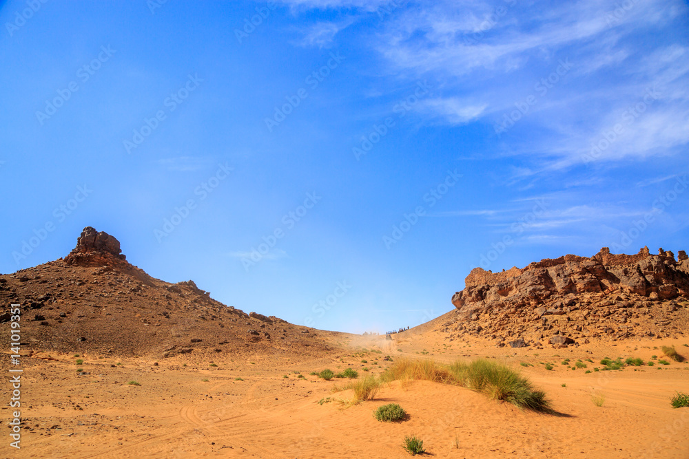 Excursion of tourists in off road vehicles in desert Excursion of tourists in off road vehicles in desert