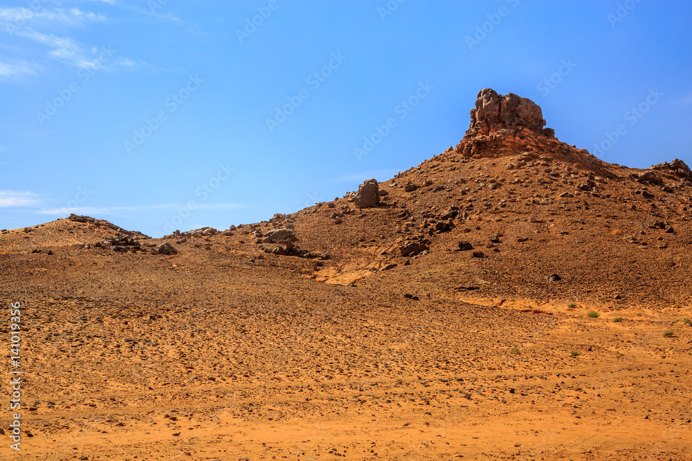 Collapsed wall of castle in moroccan desert