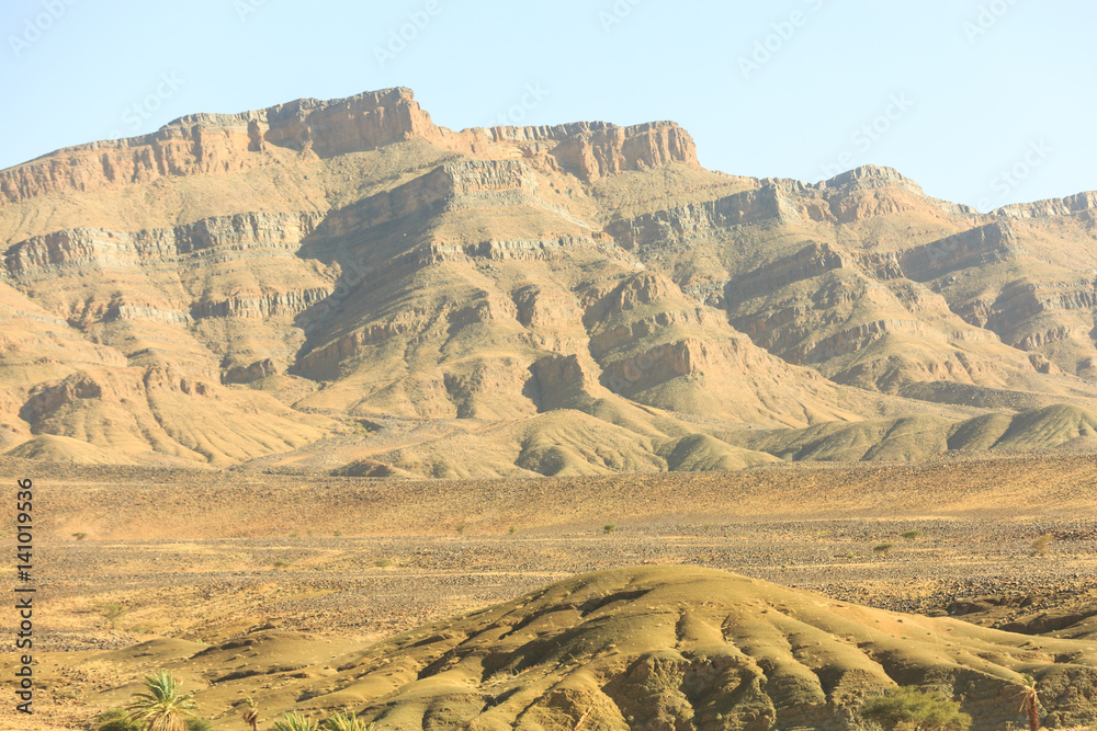 Naklejka premium Beautiful Moroccan Mountain landscape in desert with blue sky