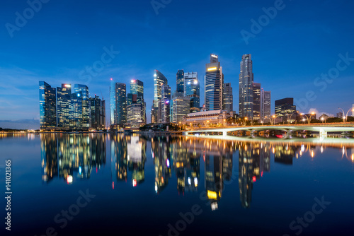 Singapore business district skyline in night at Marina Bay, Singapore. © ake1150