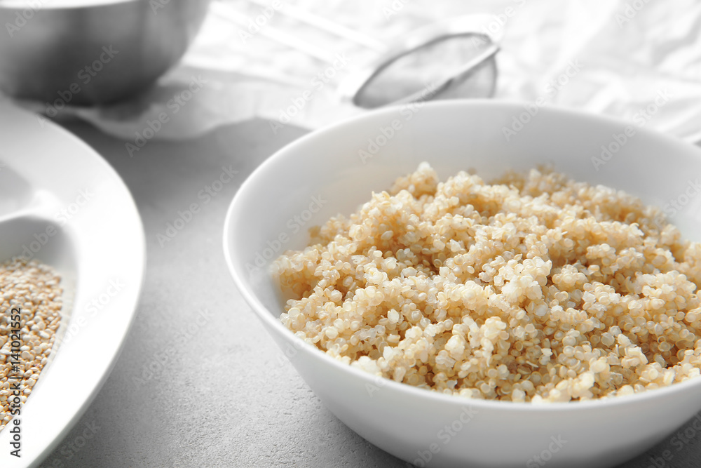 Plate with boiled sprouted organic white quinoa grains, closeup Plate with boiled sprouted organic white quinoa grains, closeup