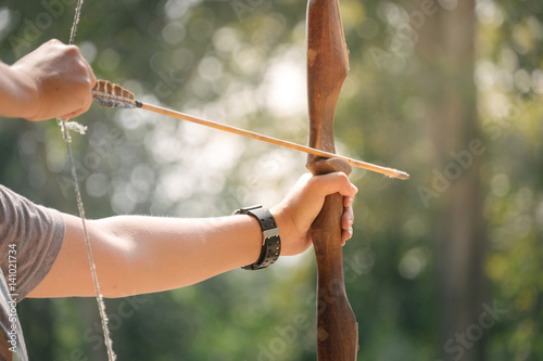 close up of Asian Male Soldier training with the arror and bow