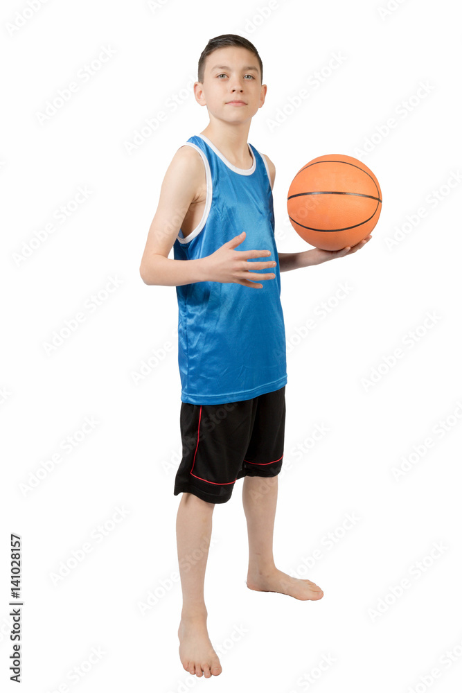 Young caucasian teenage boy with a basketball Young caucasian teenage boy with a basketball