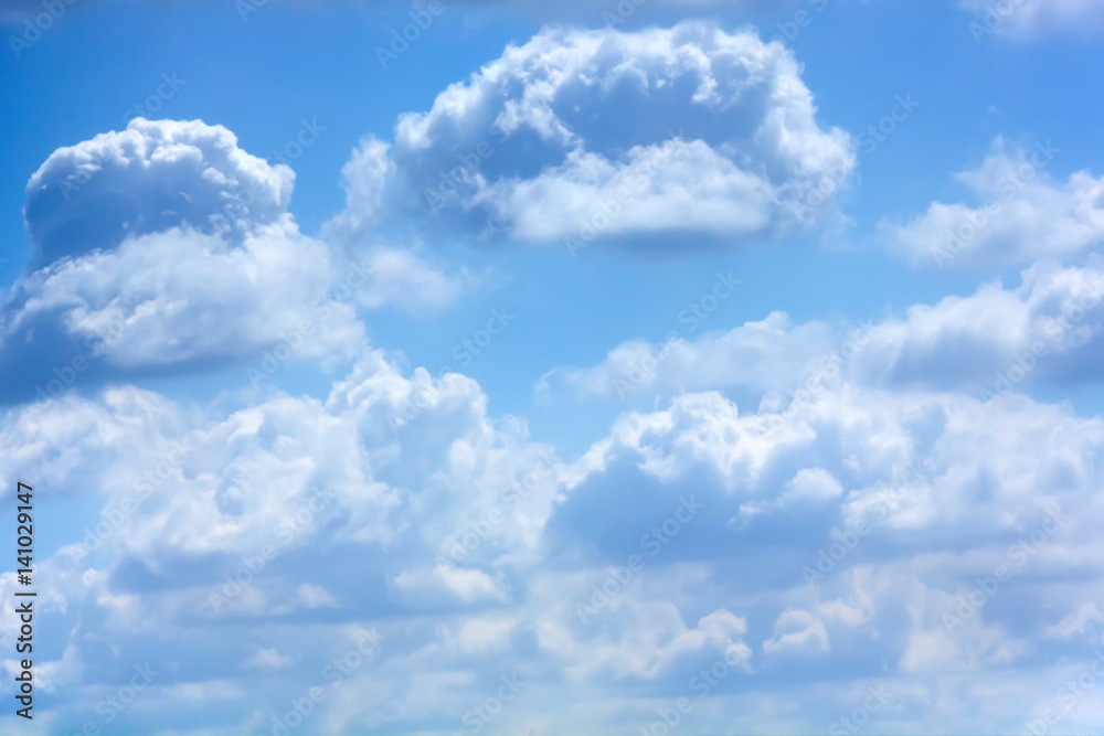 White clouds against blue sky. Day.