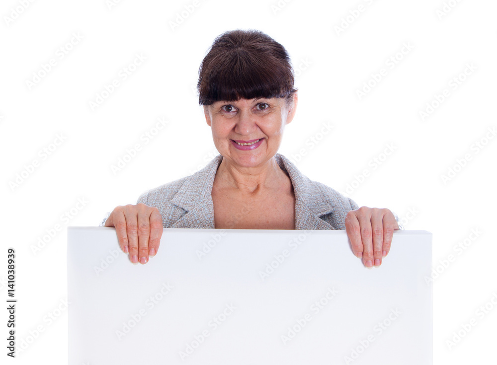 Mature woman leaning on white banner. Portrait against of white background Mature woman leaning on white banner. Portrait against of white background