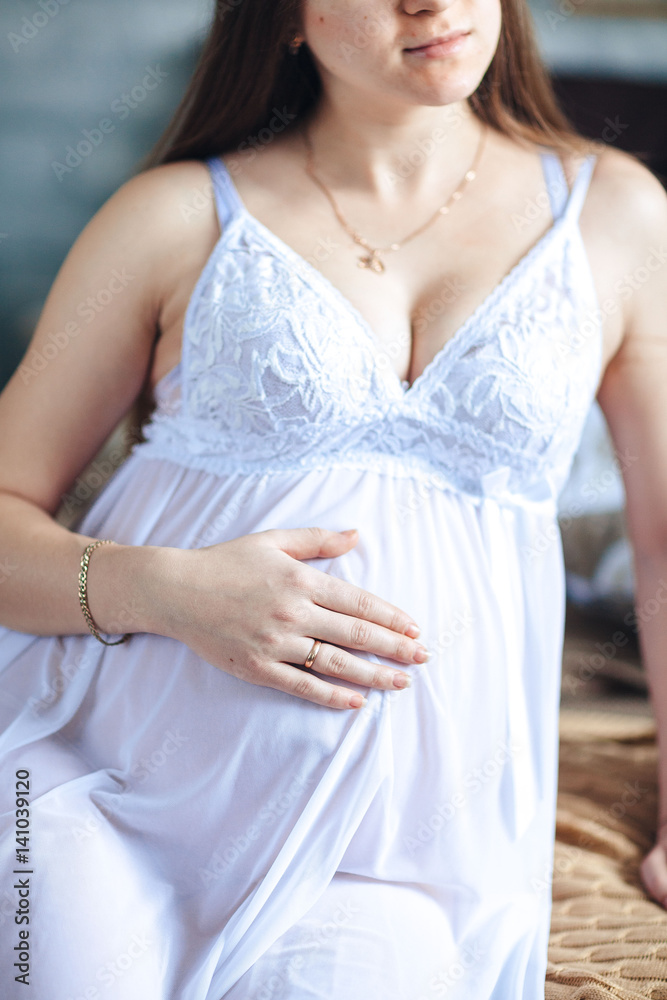 Close-up of the belly of a pregnant woman