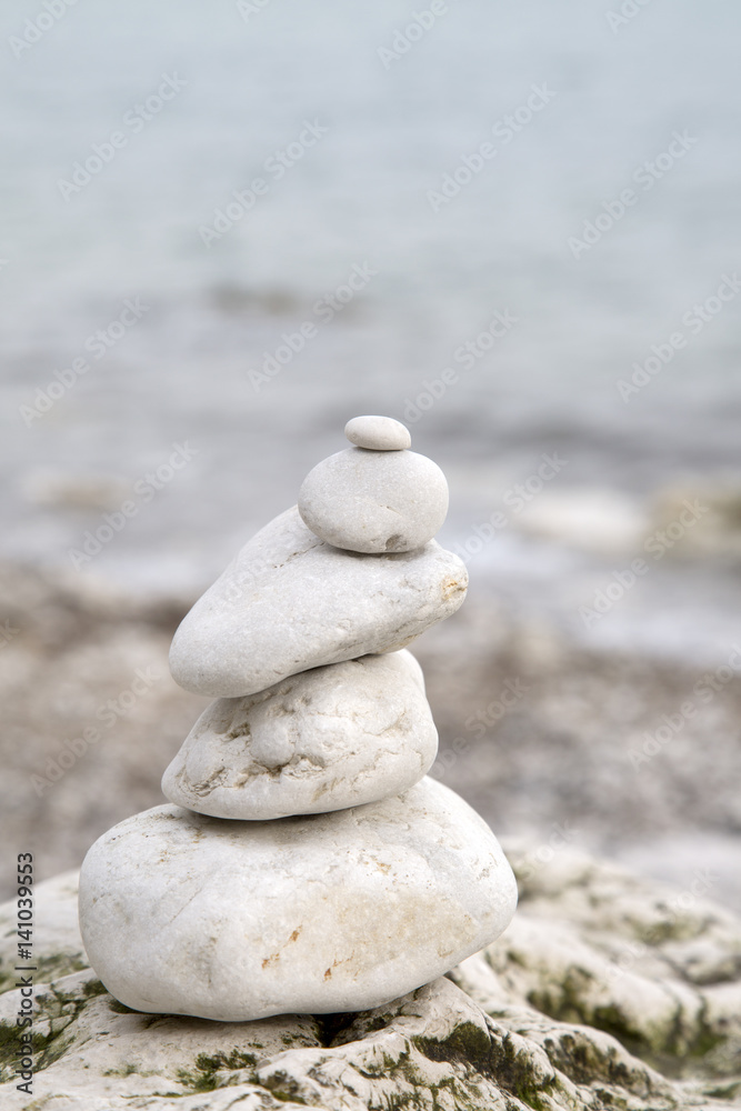 Pebble Stack in Lulworth Cove Beach, Dorset Pebble Stack in Lulworth Cove Beach, Dorset