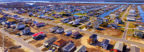 Colorful island beach and canal front houses