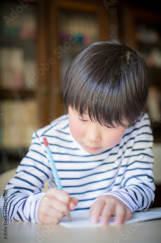 boy studying or doing home work