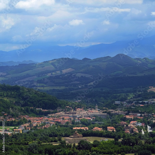 Urbania  Italy - August  1  2016  mountain landscape with a view of a small town Urbania in a North Italy