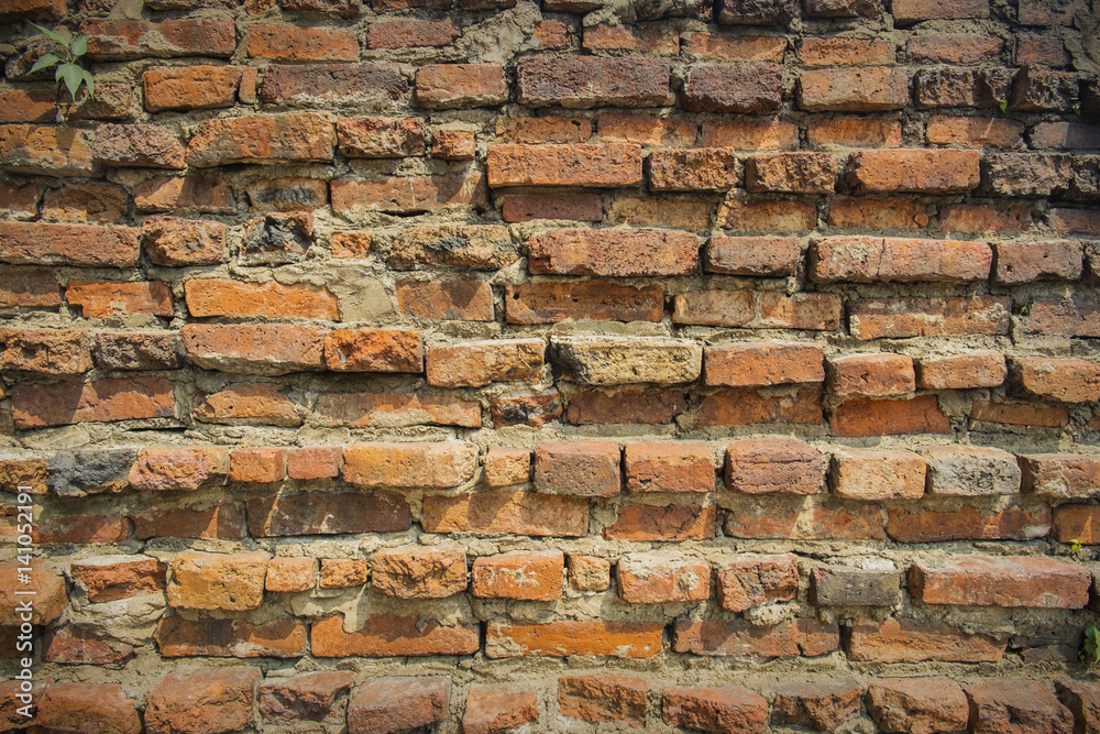 Naklejka premium Background of old vintage brick wall photo