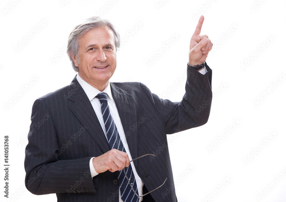 elegant senior businessman isolated on white pointing finger elegant senior businessman isolated on white pointing finger