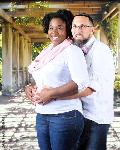 Pregnant Mixed Race Couple photo