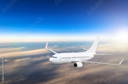 Airplane in the sky above the clouds flight journey sunset height