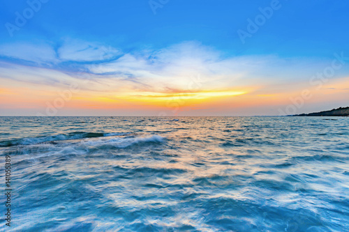 beautiful sunset at the sea with colorful shading sky