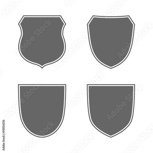 Shield shape icons set. Gray label signs isolated on white background. Symbol of protection, arms, security, safety. Flat retro style design. Element vintage heraldic emblem Vector illustration