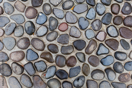 Pavement of round stones background