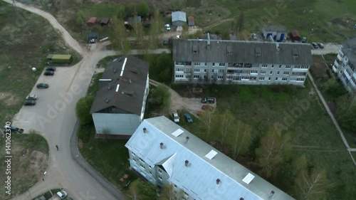 Roof of town apartment building aerial video photo