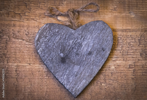 figure of wooden heart on board