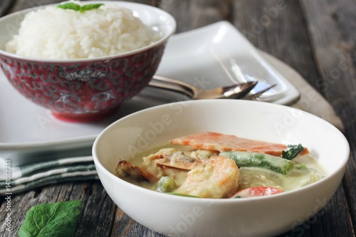 Thai Green curry served with jasmine rice, selective focus