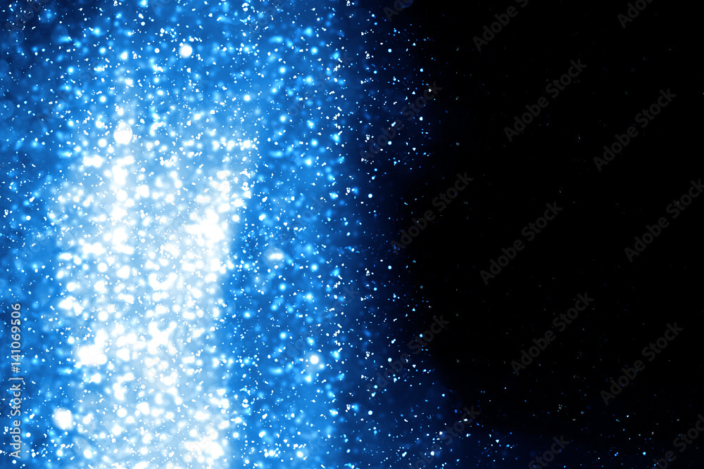Obraz premium Abstract blue round bokeh or glitter lights isolated on black background. Circles and defocused particles