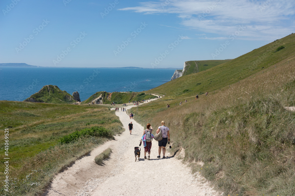 Sign at The South West Coastal path at Durdle Door & Lulworth Cove in Dorset, UK on a sunny summer's day