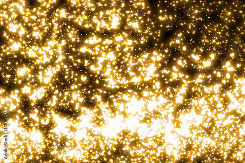 Golden abstract sparkles or glitter lights. Festive gold background. Defocused circles bokeh or particles. Template for design