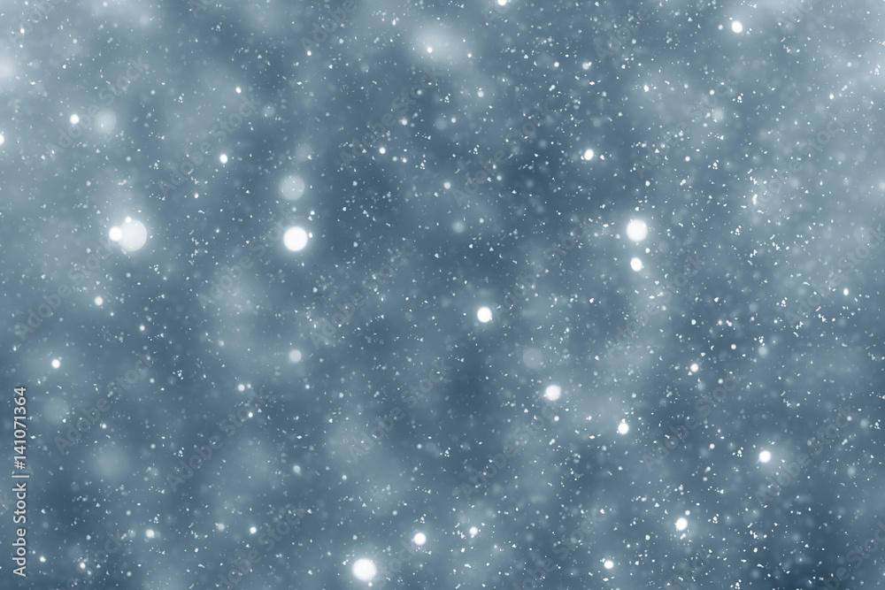 Obraz premium Snowflakes particles and bokeh or glitter lights on silver background. Christmas abstract template