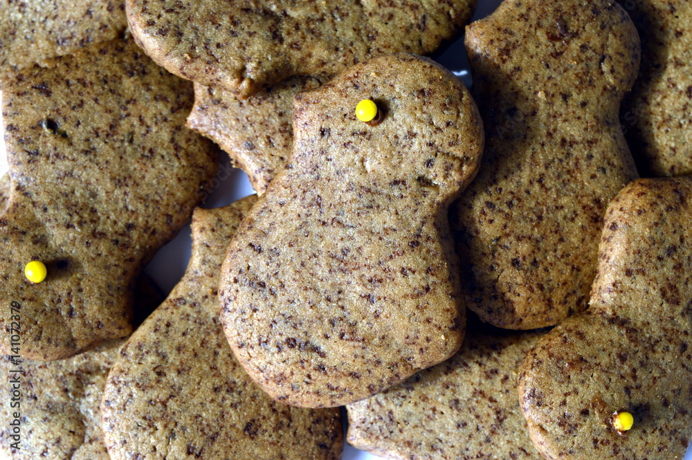 Homemade delicate butter cookies with grated chocolate in easter chicken shape Homemade delicate butter cookies with grated chocolate in easter chicken shape