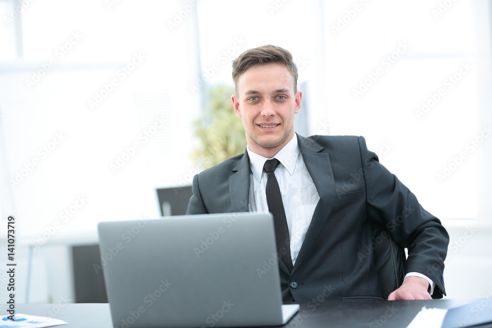 consultant on tax issues at the workplace in front of the open l consultant on tax issues at the workplace in front of the open l
