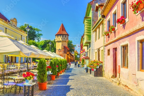 Little square and The Carpenters' Tower in Sibiu city, Transylvania region, Romania.
