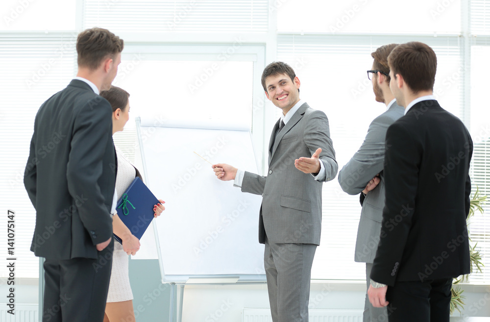 Manager makes the presentation of a new project for employees Manager makes the presentation of a new project for employees