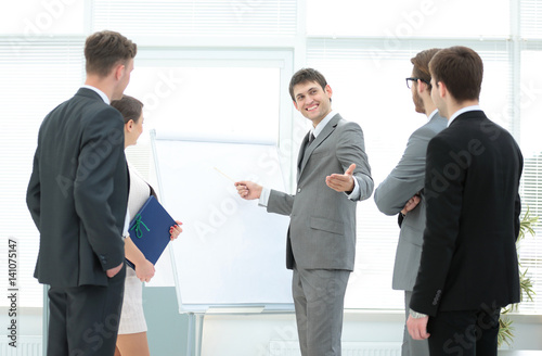 Manager makes the presentation of a new project for employees