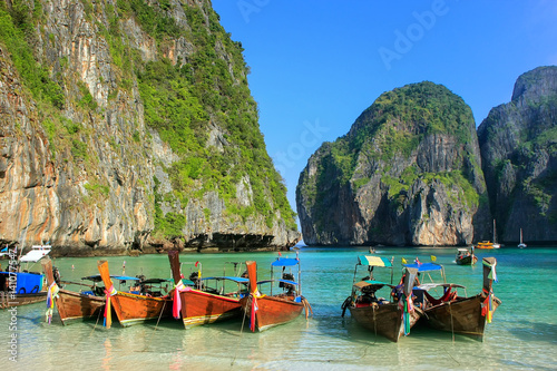 Longtail boats anchored at Maya Bay on Phi Phi Leh Island, Krabi Province, Thailand