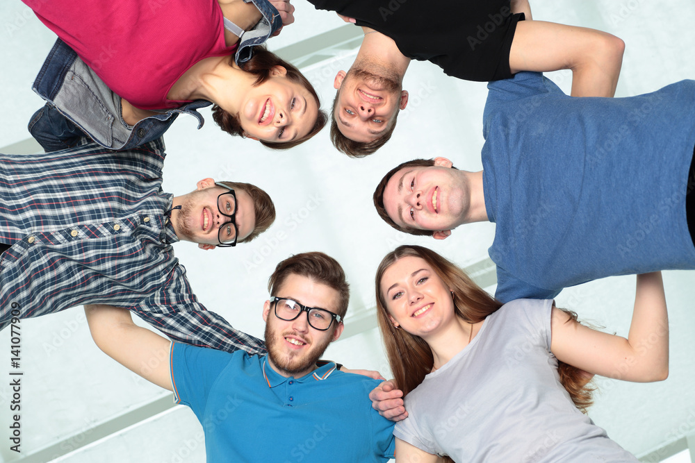 concept of friendship and reliability: a team of students, arms concept of friendship and reliability: a team of students, arms