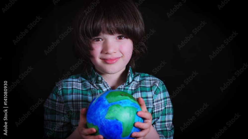 4K Cute Child Holding in Hands an Earth Globe 4K Cute Child Holding in Hands an Earth Globe