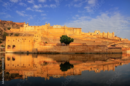 Amber Fort reflected in Maota Lake near Jaipur, Rajasthan, India. photo