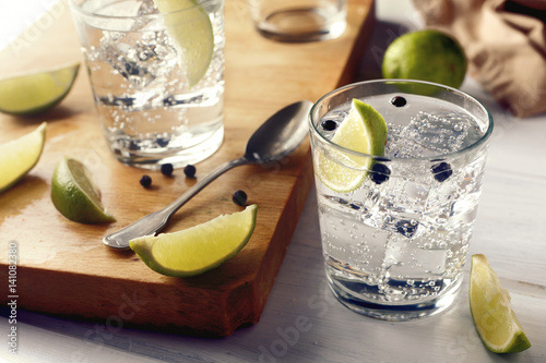 Table with gin tonic glasses and ingredients